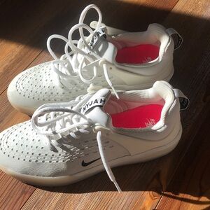 Nike White Sneakers with Black Accents